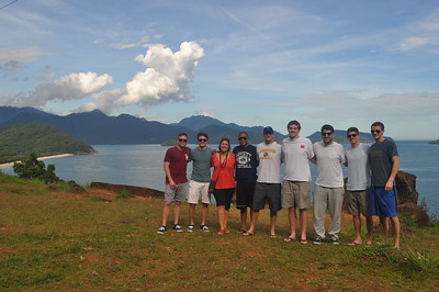 brown and white concrete buildings under white clouds during daytime